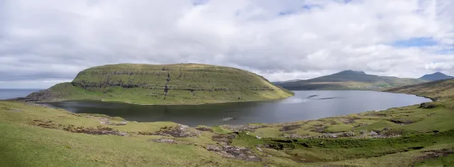 Lake Leitisvatn, which flows over a waterfall into the North Atlantic